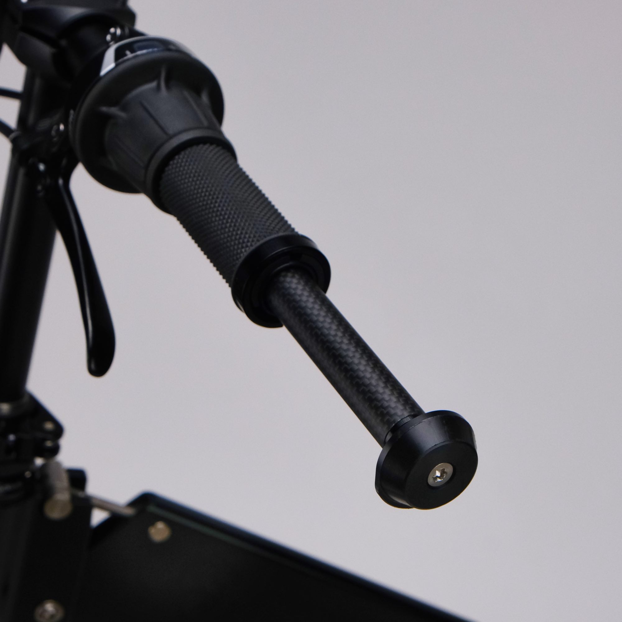 upride folding bike bike stand is being stowed inside the handlebar